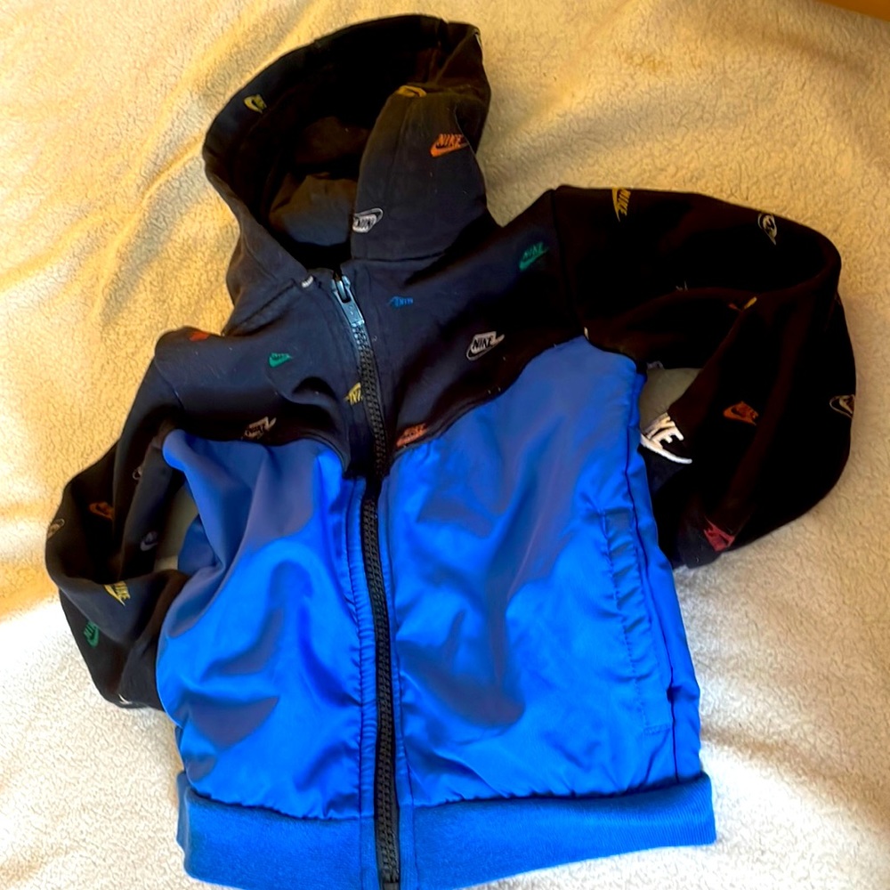 Black and blue NIKE zip up hoodie which work’s perfect